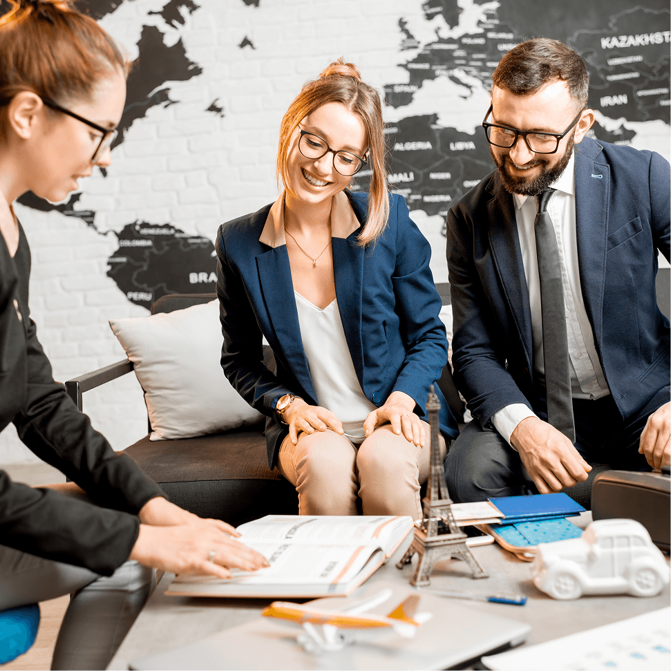 Immigration consultants reviewing documents together