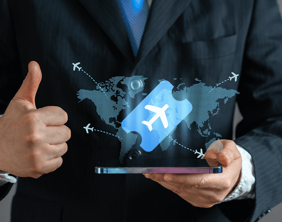 Consultant giving thumbs up while holding a smartphone with travel graphics